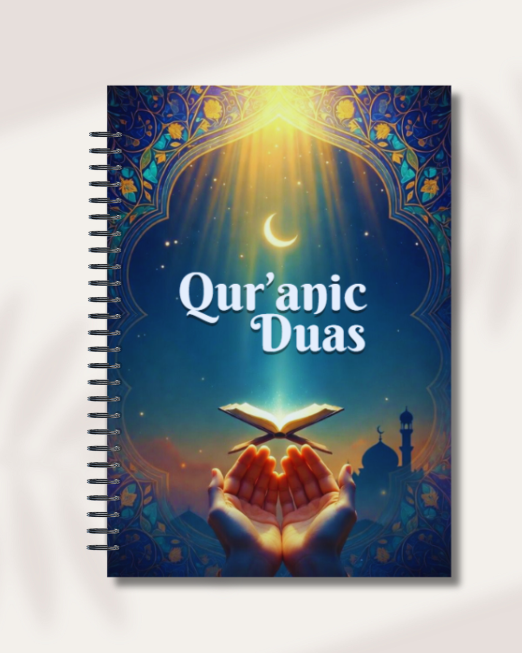 Levara Qur'anic Duas spiral notebook with glowing Quran and hands under crescent moon for dua lipa book club