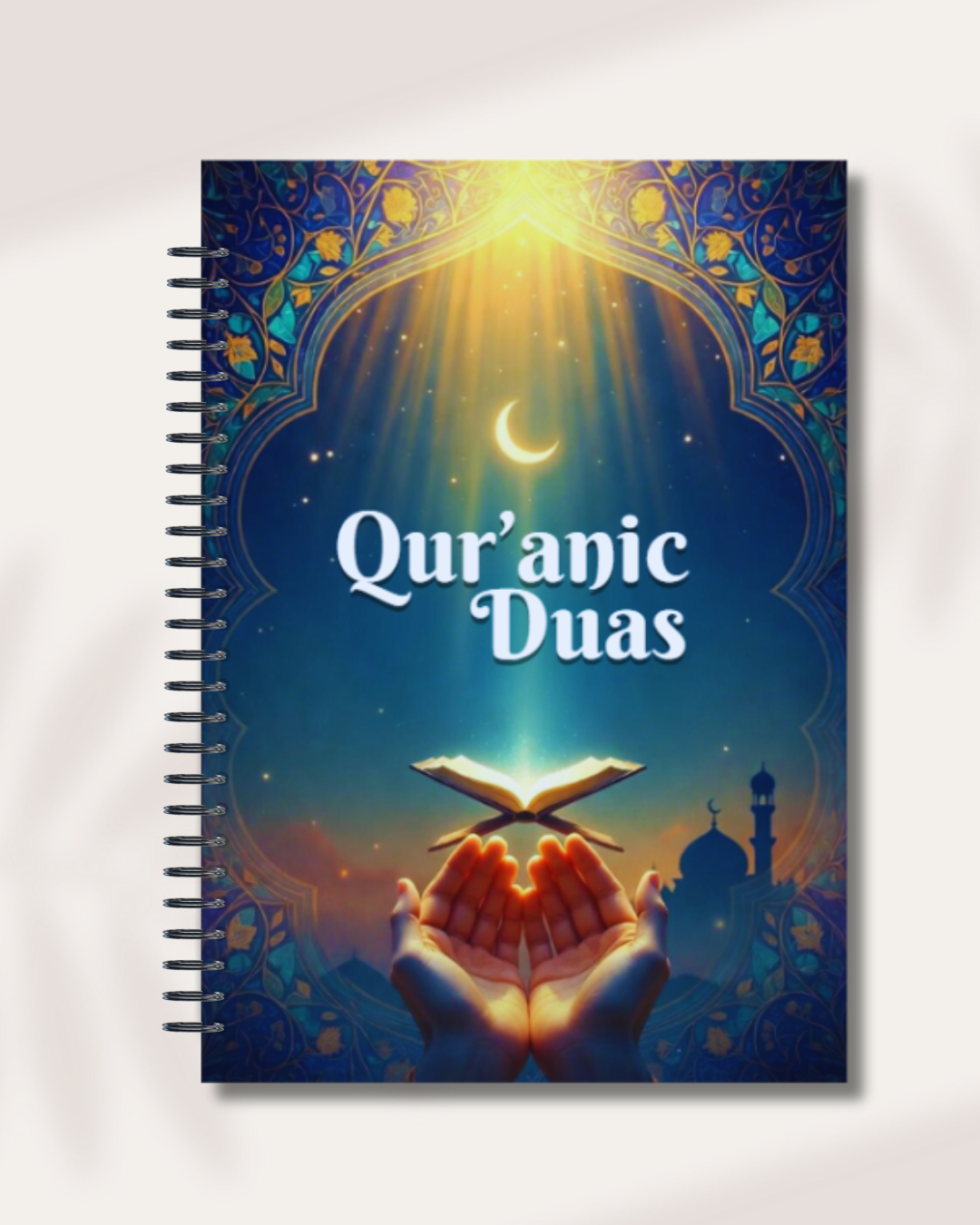 Levara Qur'anic Duas spiral notebook with glowing Quran and hands under crescent moon for dua lipa book club