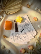 Levara Eid gifts featuring prayer-themed coloring cards with a yellow flower charm and orange soap