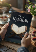 Levara Ramadan 2026 journal with open Quran design held by person with tea and flowers nearby